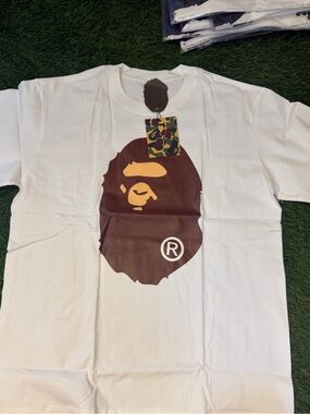 Bape White Tee with Brown & Yellow Ape Head Graphic